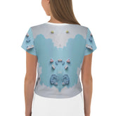 Close-up of Artistic Aviary Flight Women's Crop Tee fabric and pattern.